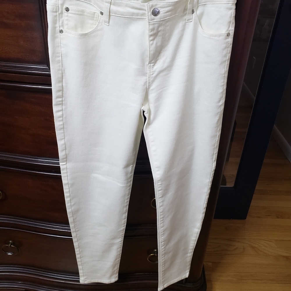 Celebrity women slacks in white, grey, blue, rust, green, peach, red and green.